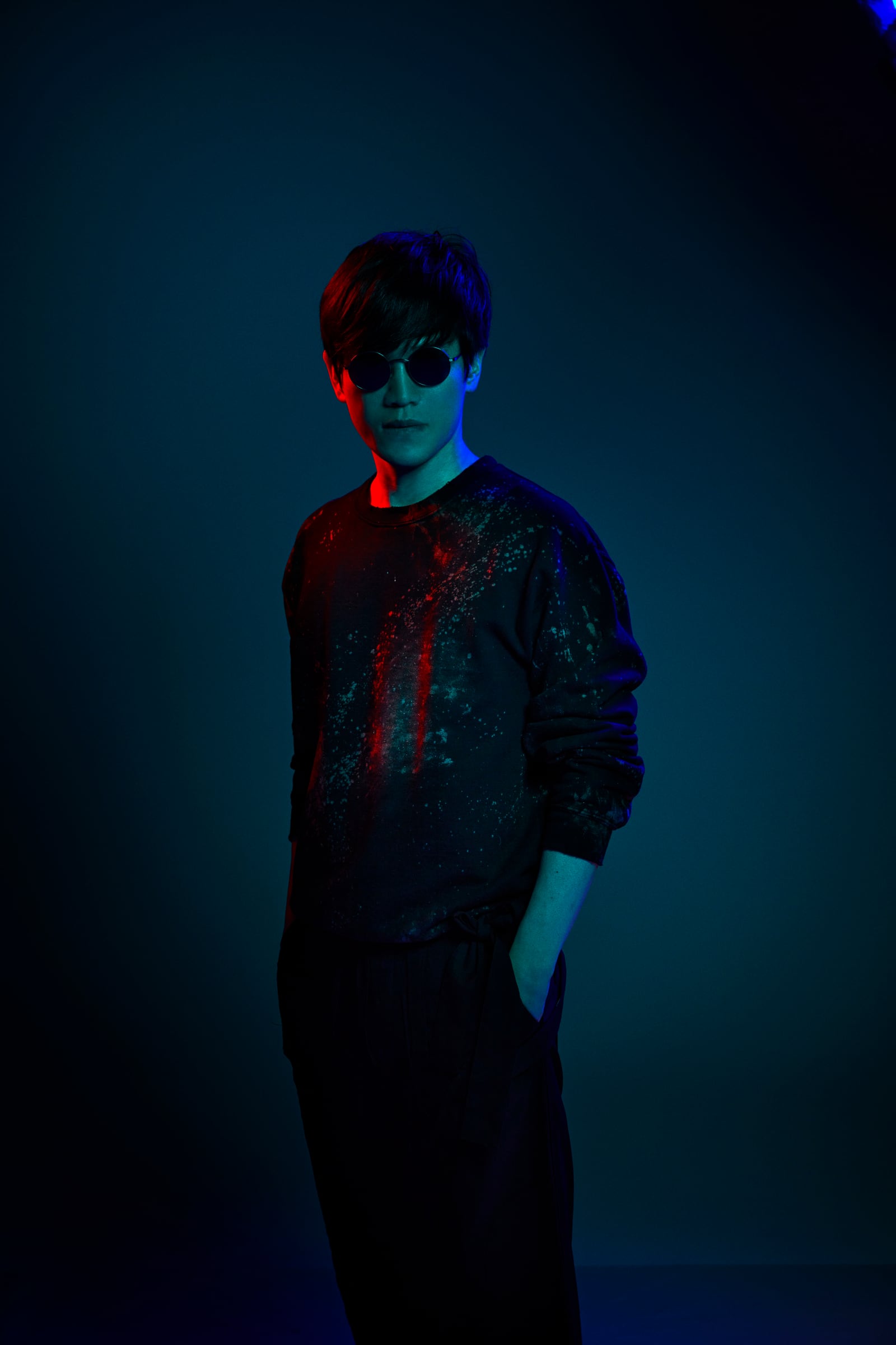 Masanori Morita photographed in blue and red light